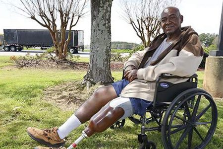 Clifford Greenfield, from Bordertown, New Jersey, sits in a parking lot of the Pilot Truck Stop last Friday in Piedmont, South Carolina. Greenfield lost his leg in a trucking accident and is now living in his car, while awaiting settlement in his case. The virus has affected his court date due to shut downs. (Photos: AP)