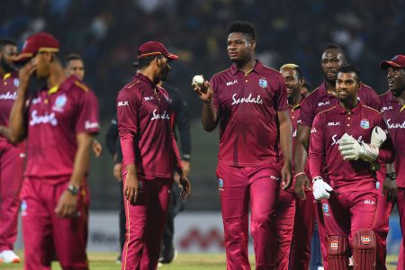 The West Indies team celebrates it’s first win in Sri Lanka yesterday