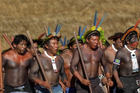 Indigenous men perform during a four-day pow wow in Piaracu village, in Xingu Indigenous Park, near Sao Jose do Xingu, Mato Grosso state, Brazil, January 14, 2020. REUTERS/Ricardo Moraes
