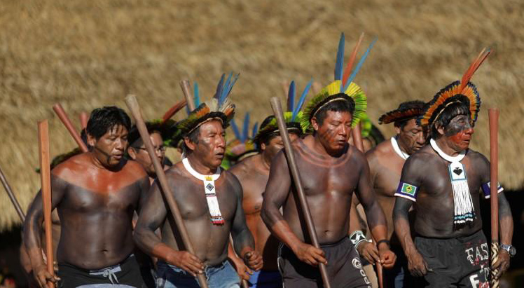 Indigenous men perform during a four-day pow wow in Piaracu village, in Xingu Indigenous Park, near Sao Jose do Xingu, Mato Grosso state, Brazil, January 14, 2020. REUTERS/Ricardo Moraes
