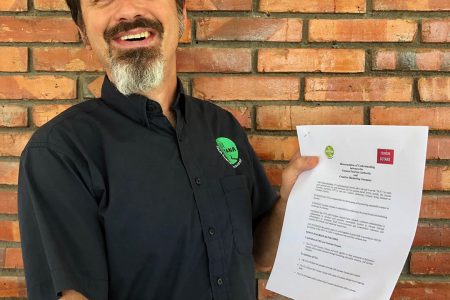 GTA Director Brian Mullis with the signed agreement