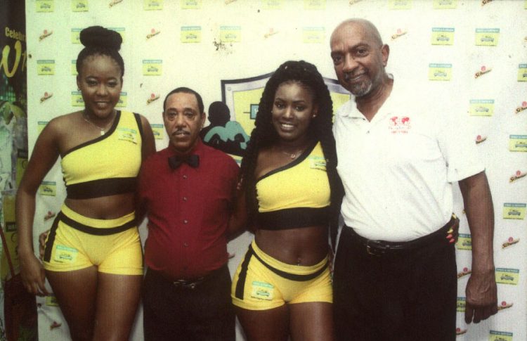The later Eddie Cotton, right, Jardine, third right and two ushers at the 2015 Contender Boxing Series in Jamaica. (Photo courtesy of Eion Jardine)