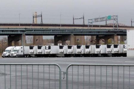 Refrigerated tractor trailers that can be used as morgues are seen, amid the coronavirus disease (COVID-19) outbreak, outside Icahn Stadium on Randall's Island in New York City, U.S., April 9, 2020. REUTERS/Brendan McDermid
