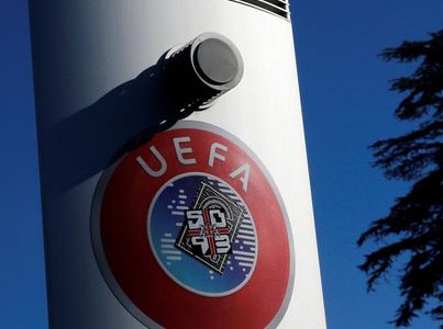 FILE PHOTO: A logo is pictured outside the UEFA in Nyon, Switzerland, February 28, 2020. Picture taken February 28, 2020. REUTERS/Denis Balibouse