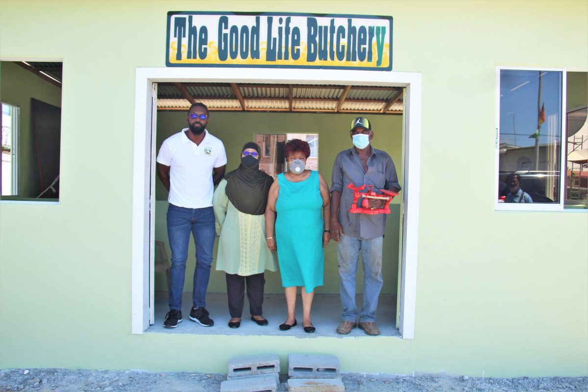 (From left to right) Member of the People’s National Congress Reform, Christopher Jones; proprietor of “The Good Life Butchery”, Latchmin Azeez; General Secretary, People’s National Congress Reform, Amna Ally and proprietor of “The Good Life Butchery” Jamal Azeez after the handing over. (APNU photo)
