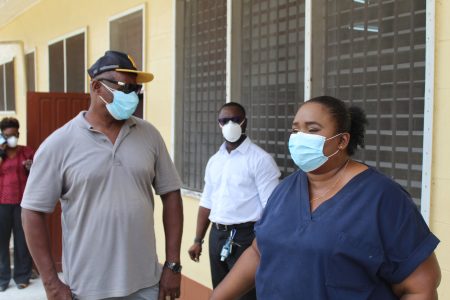 Regional Executive Officer Orrin Gordon (left) in conversation with Dr Tracey Bovell Emergency Medicine Specialist at GPHC, while Medical Superintendent at the Linden Hospital Complex, Dr Joseph London pays rapt attention.