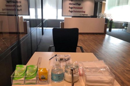 A thermometer, hand sanitizer and masks are pictured in the reception area at PageGroup’s office after reopening, as the coronavirus disease (COVID-19) continues, in Shanghai, China, April 29, 2020. (PageGroup/Handout via REUTERS photo)

