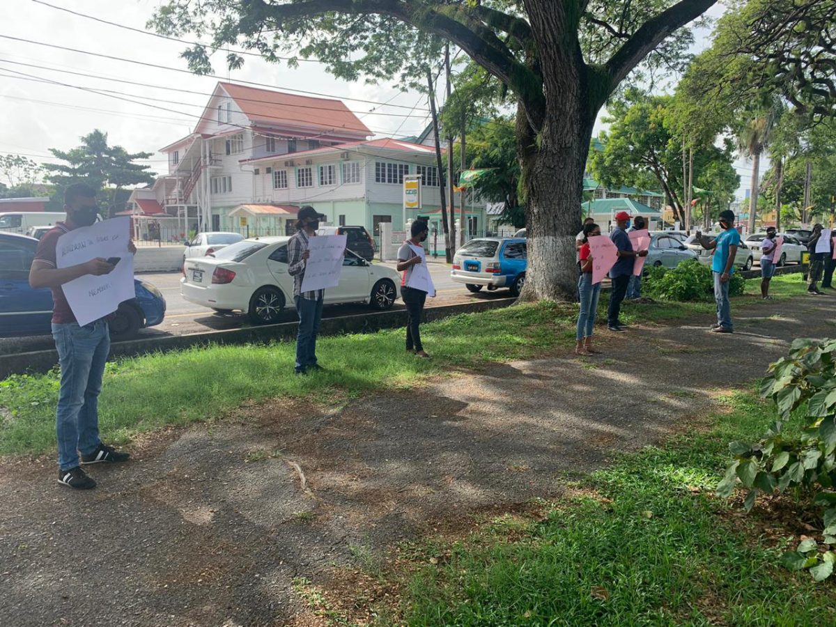 A number of persons yesterday protested outside the official residence of the Prime Minister and the Ministry of Foreign Affairs demanding that the Carter Center be allowed to enter the country to observe the national recount. 
