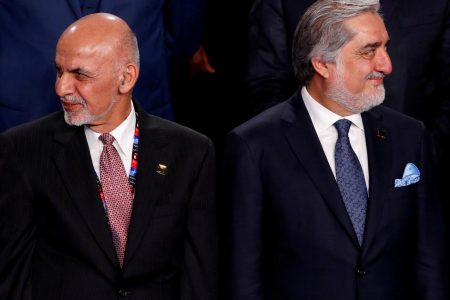 Afghanistan’s President Ashraf Ghani (L) and Afghanistan’s Chief Executive Abdullah Abdullah (R) participate in a family photo at the NATO Summit in Warsaw, Poland July 8, 2016. REUTERS/Jonathan Ernst/File Photo