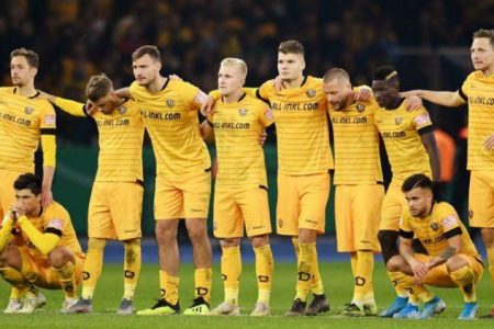 FILE PHOTO: Dynamo Dresden players during a penalty shootout last year. REUTERS/Annegret Hilse
