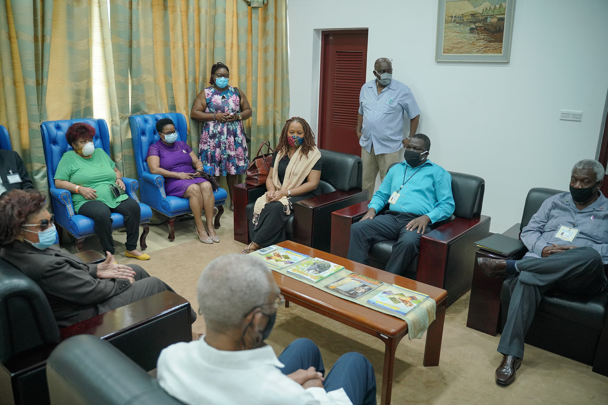  President David Granger (back to camera) meeting with the three- member CARICOM scrutinising team and the GECOM Chair at the Arthur Chung Conference Centre. (Ministry of the presidency photo)