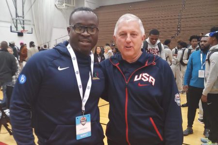 Junior Hercules (left) posing with Director of Coach Development of the USA Basketball Youth Division Don Showalter at the USA Olympic Training Facility in Colorado in 2018

