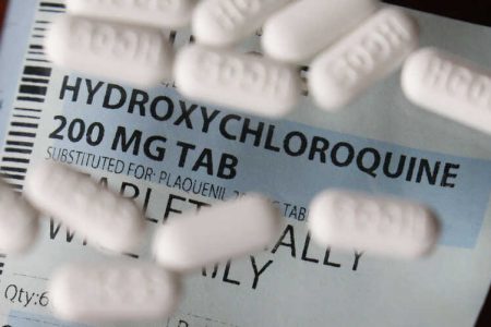 FILE – This Monday, April 6, 2020, file photo shows an arrangement of Hydroxychloroquine pills in Las Vegas. At least 13 states have obtained a total of more than 10 million doses of malaria drugs to treat COVID-19 patients despite warnings from doctors that more tests are needed before the medications that President Trump once fiercely promoted should be used to help people with the coronavirus. (AP Photo/John Locher,File)