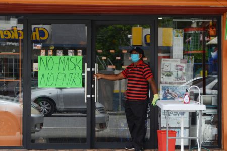  That was the message at this Vreed-en-Hoop store yesterday as measures are stepped up against the COVID-19 pandemic. The store also has a sanitation station. (Orlando Charles photo)