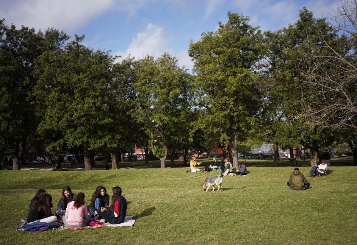 People sit together in a park as the country has managed to get the coronavirus disease (COVID-19) under control, in Montevideo, Uruguay May 23, 2020. Picture taken May 23, 2020. REUTERS/Mariana Greif