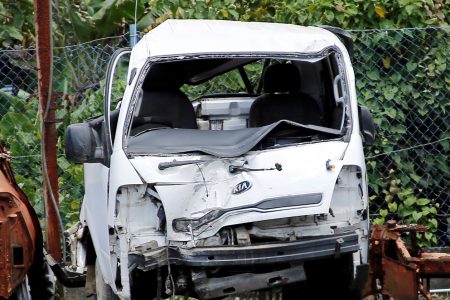 The panel van which was involved in the accident along the North Coast Road, Las Cuevas, on Sunday. A woman was killed and seven others hurt in the accident as they were returning from a COVID lime at Las Cuevas.