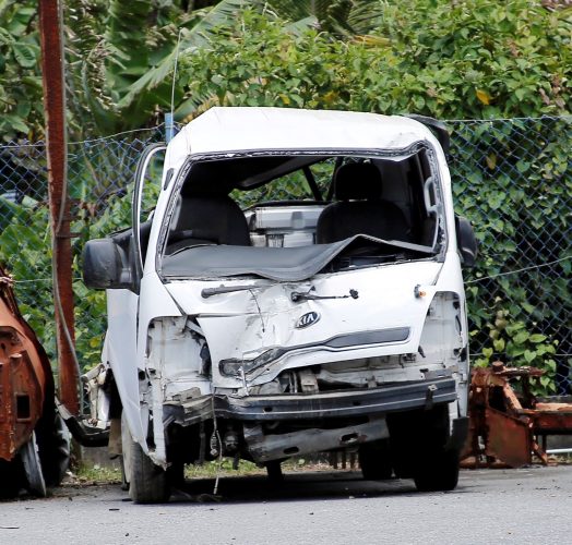 The panel van which was involved in the accident along the North Coast Road, Las Cuevas, on Sunday. A woman was killed and seven others hurt in the accident as they were returning from a COVID lime at Las Cuevas.