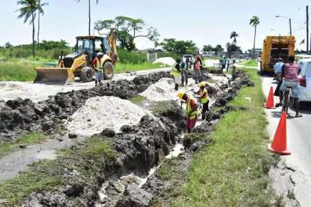 Guyana Water Incorporated (GWI) employees working to replace the ruptured pipeline at Cemetery Road, Georgetown (GWI photo)