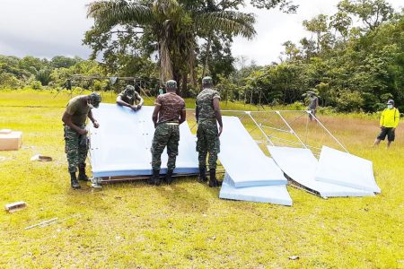  Isolation tents being erected at the Sheba sports ground in the Moruca sub-district. (DPI photo)