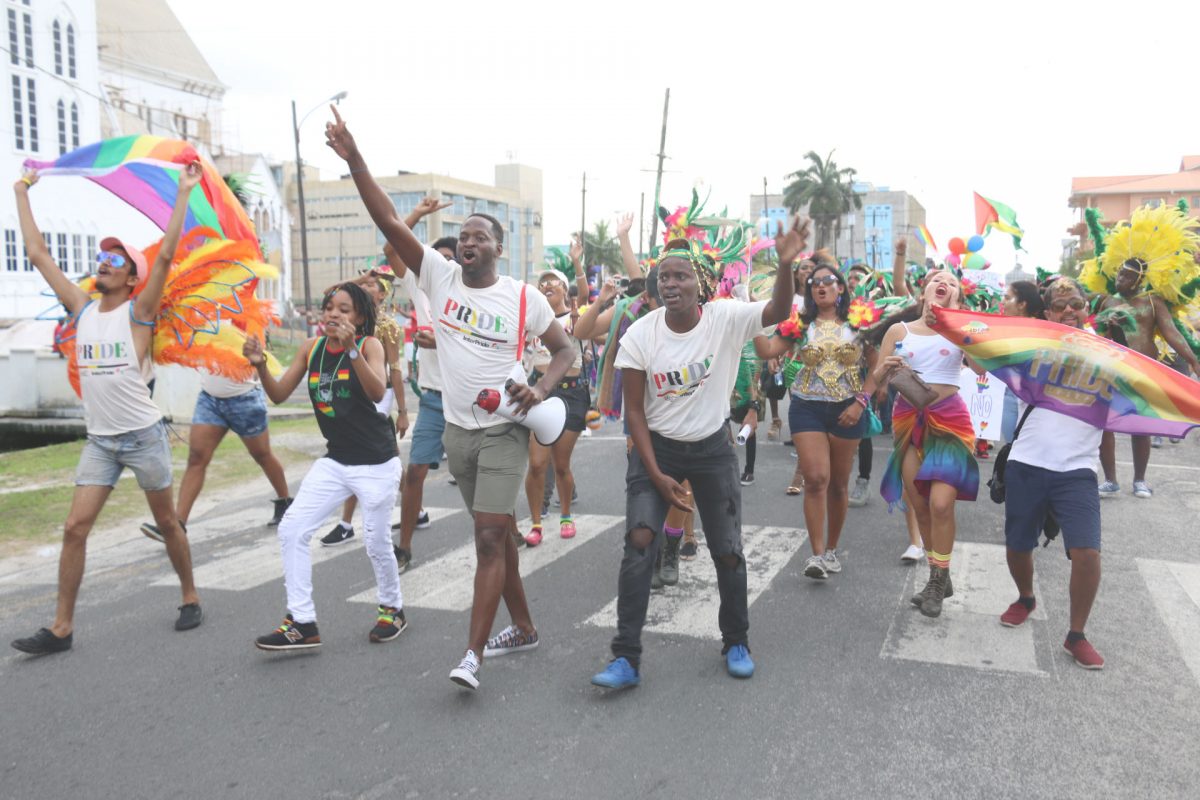 Joel Simpson (third, from right) with other revelers who were part of Guyana’s first ever LGBT Pride Parade in June, 2018. 