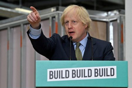 Britain's Prime Minister Boris Johnson gestures as he delivers a speech during his visit to Dudley College of Technology in Dudley, Britain, June 30, 2020. Paul Ellis/Pool via Reuters