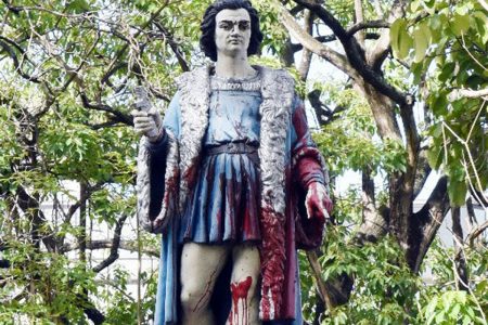 Defaced: Red paint is splattered on the statue of Christopher Columbus in Columbus Square, corner of Independence Square and Duncan Street, Port of Spain.