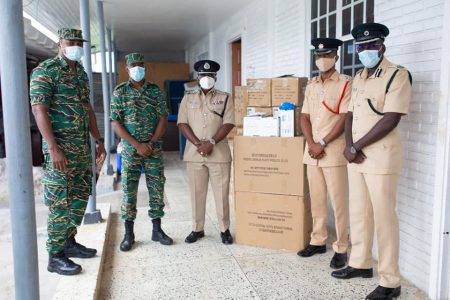 The Civil Defence Commission (CDC), with the support of SBM Offshore, on Friday handed over a quantity of gloves and face masks to the Joint Services. In a post on its Facebook page, the CDC said that the aim of the gesture is to protect law enforcement officials as they carry out their duties during the new coronavirus disease (COVID-19) pandemic. The Director General of the CDC, Lieutenant Colonel Kester Craig, handed over the items to representatives of the Guyana Fire Service, the Guyana Prison Service and the Guyana Police Force at the CDC Headquarters at Thomas Lands. In photo is Craig (second from left) with members of the Joint Services during the handing over of the items. (CDC photo)