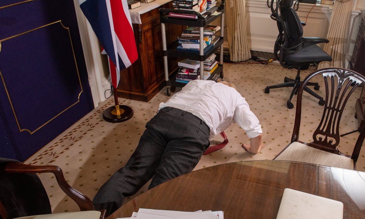 In an interview with the Mail on Sunday he declared he was 'as fit as a butcher's dog' before doing press-ups in his office. (Daily Mail photo)
