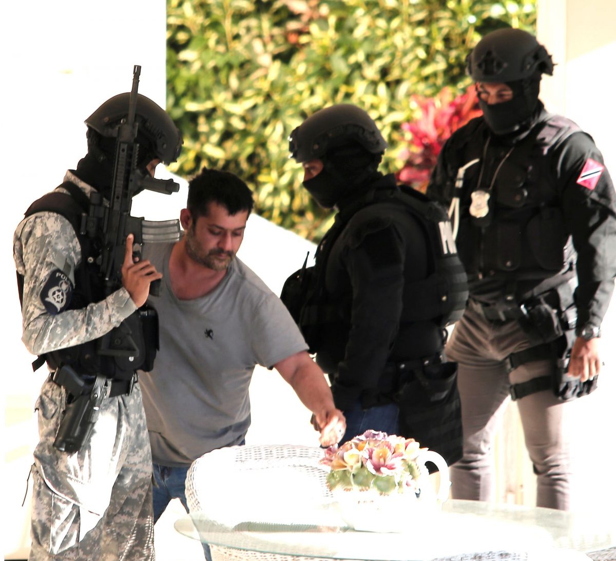 Michael Patrick Aboud when he was held by SORT officers during a raid at a property in St Clair.