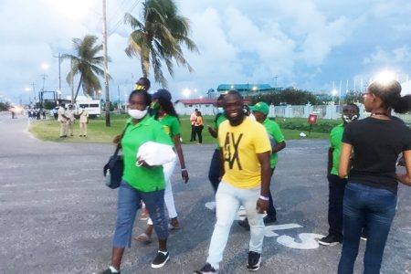 APNU+AFC counting agents leaving the recount centre yesterday afternoon.