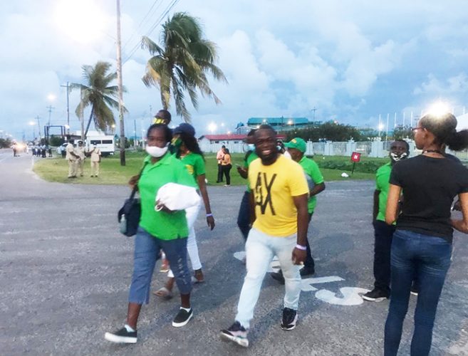 APNU+AFC counting agents leaving the recount centre yesterday afternoon.
