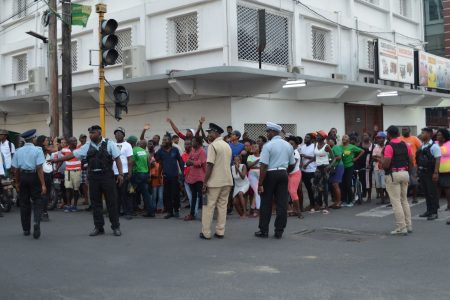 Supporters from APNU+AFC outside of the District Four Returning Officer’s office during the controversy