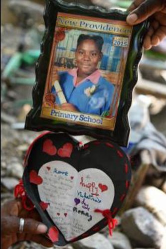 A graduation photo of Chrisey-Ann Davis and a poem she wrote to her mother for Mother’s Day. Chrisey-Ann was found hanging from a tree in her yard on Monday, June 1.