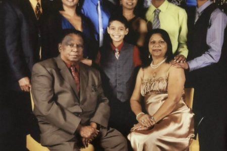 Pictured in back row, from left to right: Amar Jairam, Annette Persaud-Jairam, Prem Persaud, Janet Persaud, Gregory Persaud and Ryan Jairam. Front row: Deo Persaud, Kevin Jairam and Sylvia Persaud. (Tampa Bay Times/Annette Persaud-Jairam photo) 