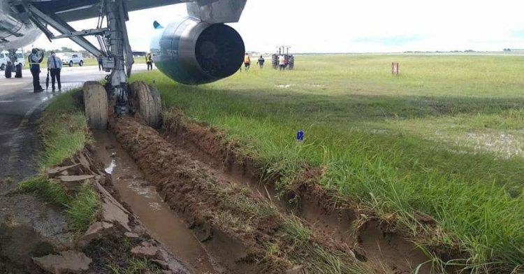 The wheels of the Boeing 767 aircraft were stuck after it skidded off the runway. (DPI photo)