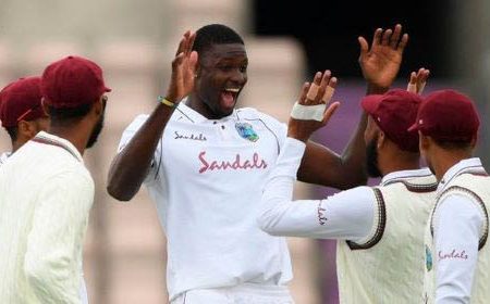 Fast bowler Jason Holder (centre) celebrates another wicket during his six-wicket haul on Thursday. 