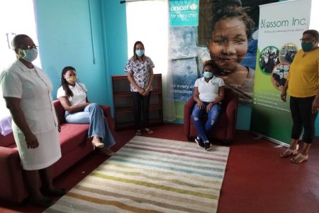 Several partners at the opening of the Child Advocacy Centre at Kwakwani, Region 10 on Wednesday, July 8, 2020 (UNICEF photo)