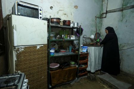 Mariam Khaled Maksoud works inside her kitchen in Tripoli, northern Lebanon on July 1, 2020. (REUTERS/Mohamed Azakir photo)
