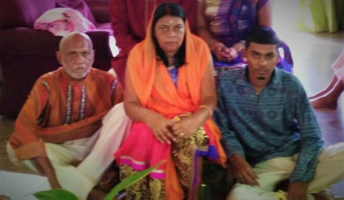 Aneil Ramjass with his mother Satie and deceased father Rajendra Ramjass.