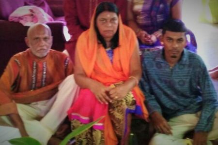 Aneil Ramjass with his mother Satie and deceased father Rajendra Ramjass.