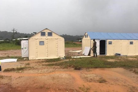 Isolation tents being set up at Aranka in the Cuyuni River 