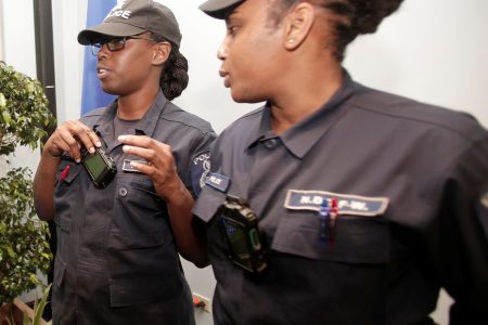 File photo: Police officers display body cameras during their launching at the St Joseph Police Station in July 2017.