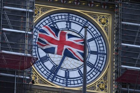 The Union flag flutters near the clock face of Big Ben during ongoing renovations to the Tower and the Houses of Parliament, in central London. (Photo: AP)