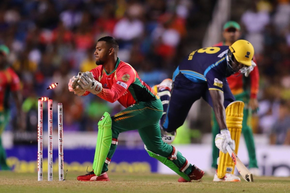 NEVER A DULL MOMENT: In this October 12, 2019 photo, Barbados Tridents’ Jason Holder, right, is run out by Guyana Amazon Warriors’ Nicholas Pooran on a throw from Keemo Paul – not in picture – in the Hero Caribbean Premier League Final at Brian Lara Stadium in Tarouba, Trinidad. The Tridents won by 27 runs.