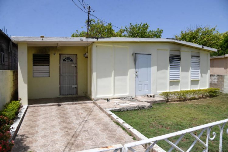 The house on Charles Drive in Bridgeport, Portmore, where the burnt body of Karen Nugent was discovered early Sunday morning. Nugent was 36