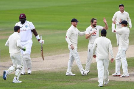 ALL OVER BAR THE SHOUTING! England’s Chris Woakes celebrates taking the wicket of Rahkeem Cornwall. (Reuters photo)
