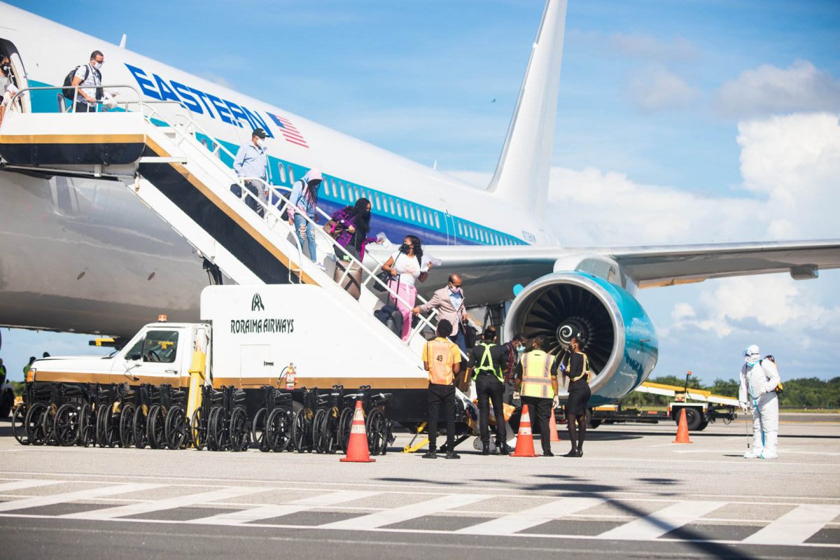 Guyanese who arrived on the Eastern Airlines flight EAL 232 last Thursday afternoon. A total of 195 Guyanese citizens returned home on the repatriation flight, which originated in New York. (Department of Public Information photo)