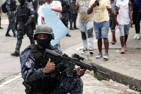Members of the Police Guard and Emergency Branch in Sea Lots, Port-of-Spain on Wednesday.