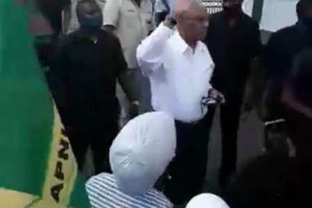 A screen shot  taken from a live video which shows caretaker President David Granger addressing supporters outside of State House yesterday afternoon.
