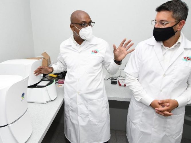 Dr Andre Gordon, (left) chairman and chief executive officer of Technological Solutions Limited (TSL), and Benjamin Pascal, co-founder of Invisible Sentinel, speaking with the media during a tour of TSL’s Resilient Centre Lab in St Andrew on July 23, 2020 - Rudolph Brown photo